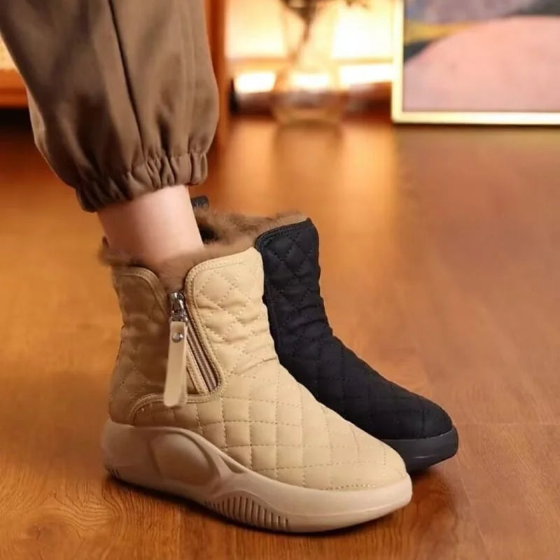 Beige und schwarze Damen-Winterstiefel, gesteppt, mit Reißverschluss, warm gefüttert, rutschfest.