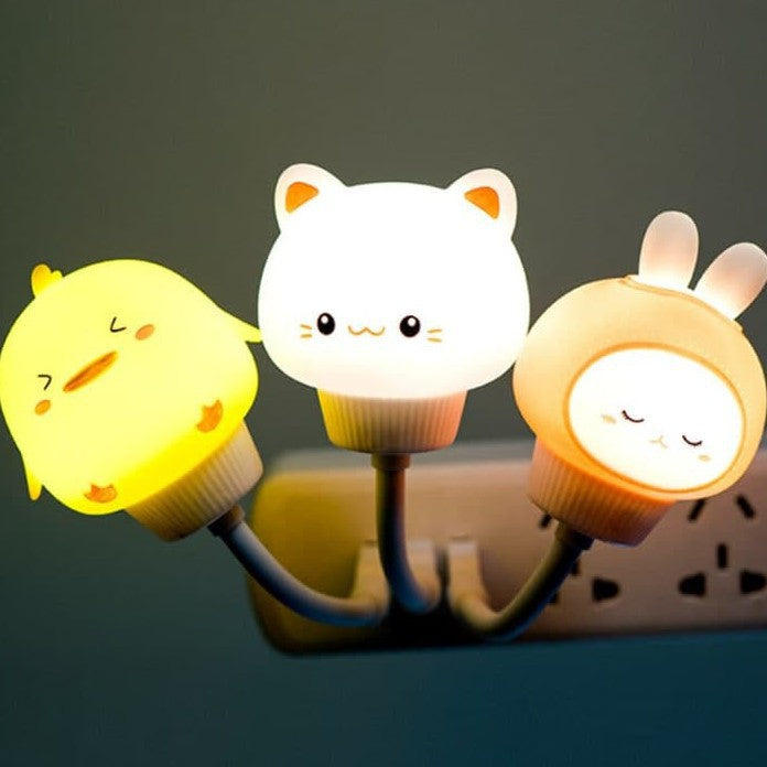 Drei LED-Nachtlichter in Tierform: Küken, Katze, Hase, leuchtend, Kinderzimmer-Dekoration.