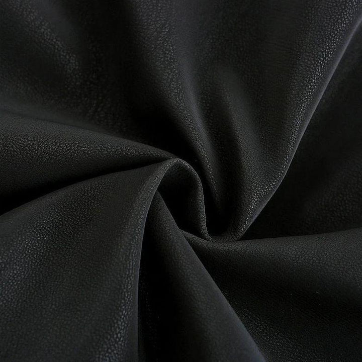 Schwarzer Kunstlederstoff, strukturiert, ideal für Polster, Taschen, Bekleidung.