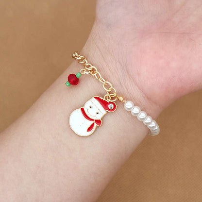 Armband mit Schneemann-Anhänger, goldfarben, Perlen, Weihnachtsdesign, Damenmode.