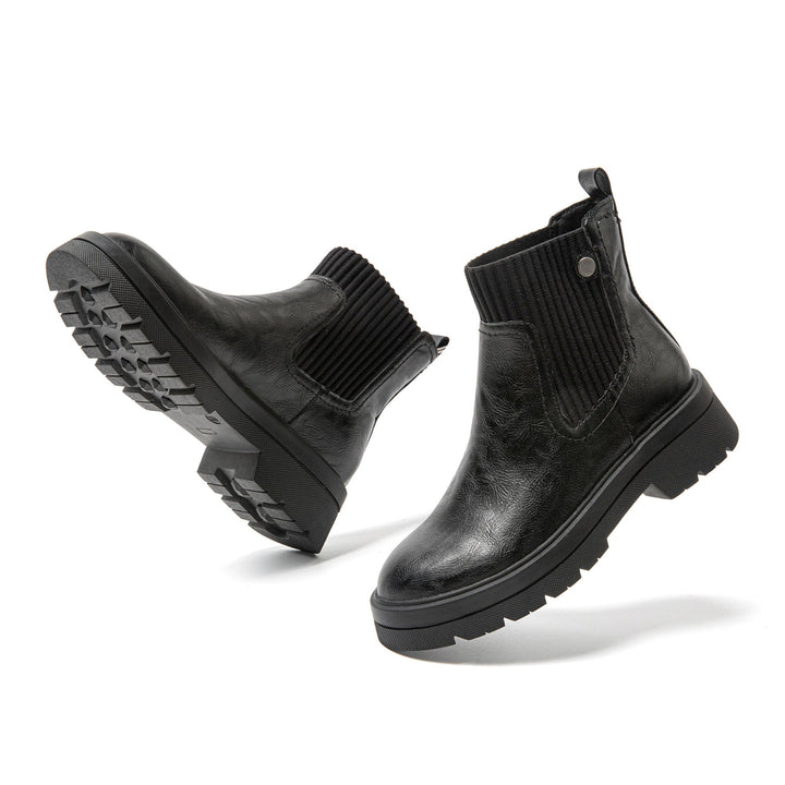 Schwarze Chelsea Boots aus Leder mit Profilsohle, elastischen Einsätzen, Damenmode.