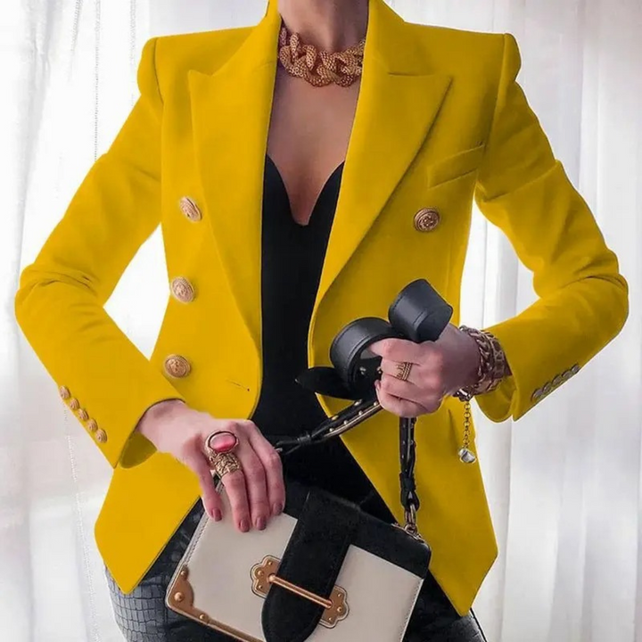 Gelber Damenblazer mit doppelter Knopfreihe, Vintage-Stil, elegantes Design, modisch.