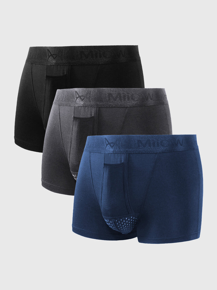 Drei Herren-Boxershorts in Schwarz, Grau und Blau, Baumwolle, bequemer Schnitt.