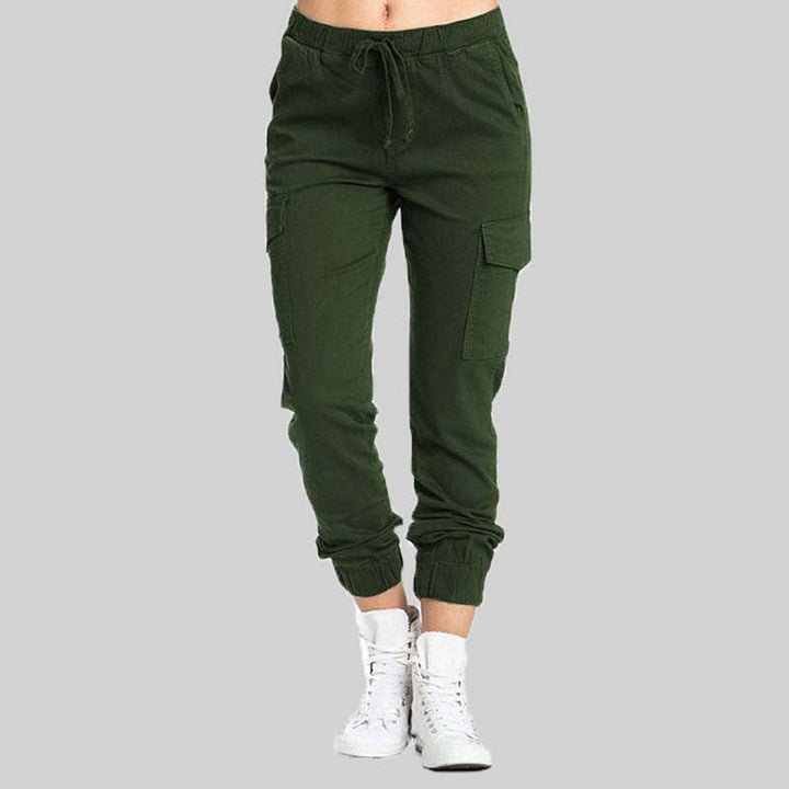 Grüne Cargo-Jogginghose Damen, Baumwolle, elastischer Bund, Seitentaschen, sportlich.