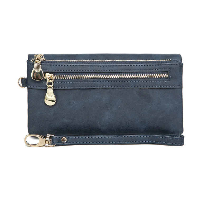 Dunkelblaue Leder-Geldbörse mit Reißverschlüssen, Damen-Portemonnaie, elegant und praktisch.