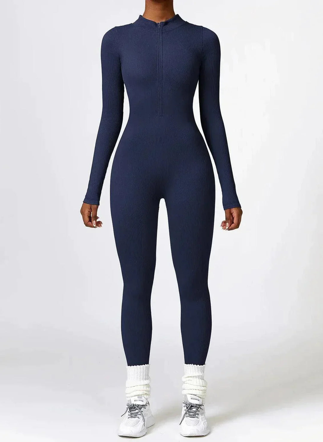 Dunkelblauer Damen-Jumpsuit, langärmelig, figurbetont, Reißverschluss, sportlich, elegant.
