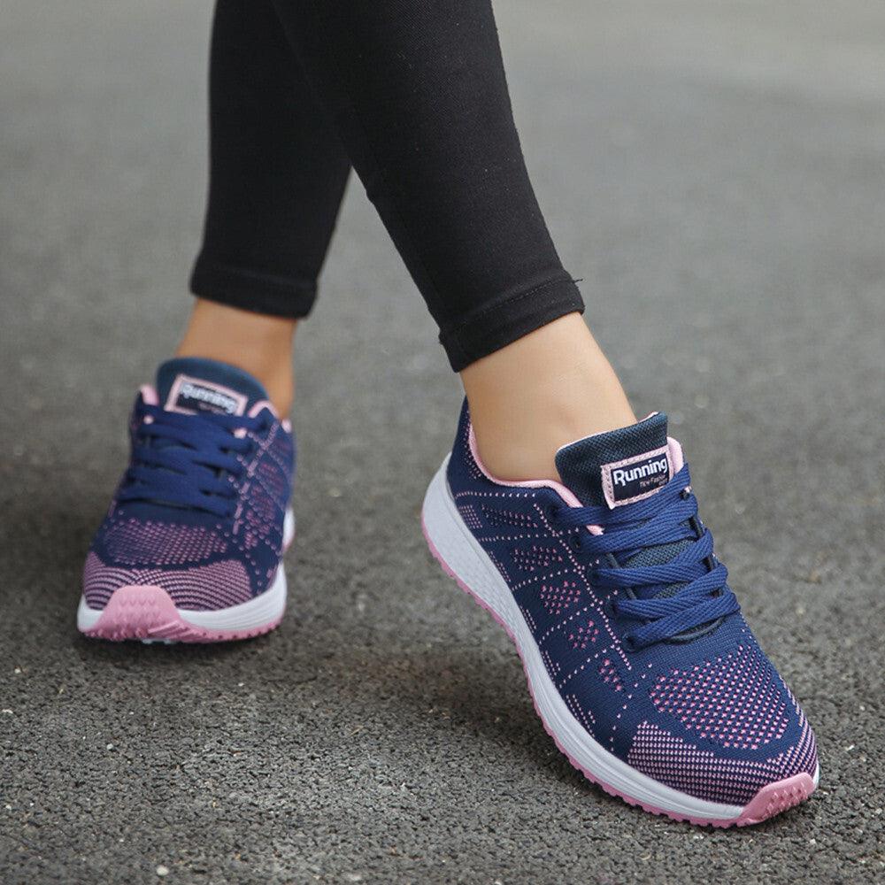 Damen-Laufschuhe blau-rosa, atmungsaktiv, rutschfest, ideal für Sport und Freizeit.