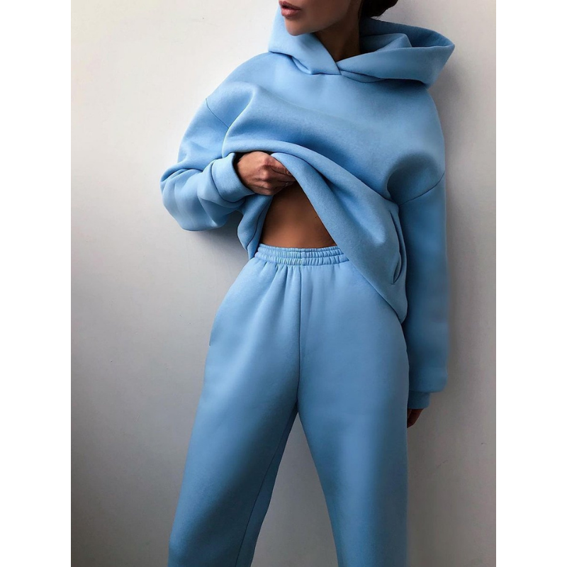 Damen Oversized Trainingsanzug, hellblau, Kapuzenpullover und High-Waist-Hose, bequemes Design.