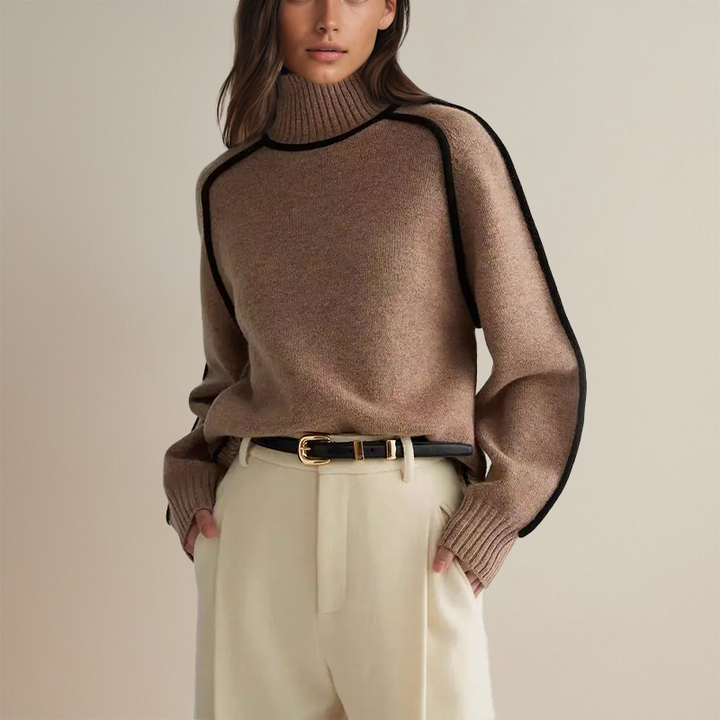 Frau in braunem Rollkragenpullover und beigen Hosen, modisch, elegant, Herbstmode.
