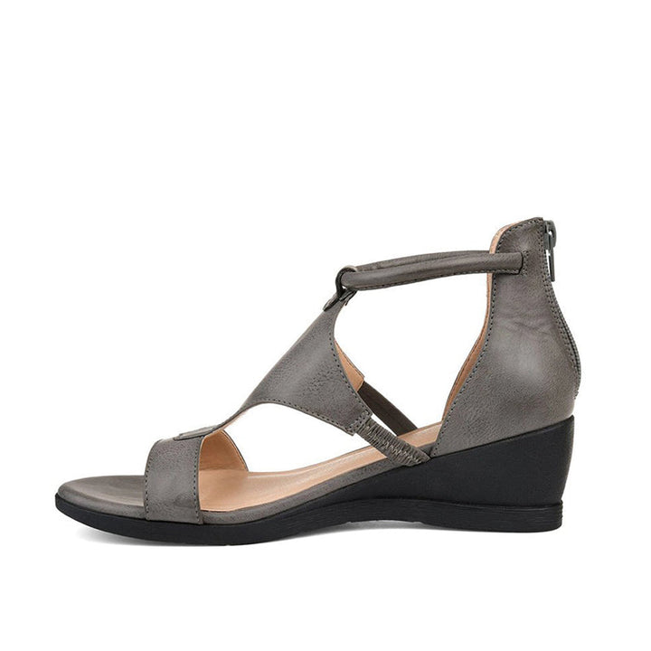 Graue Damen-Sandale mit Keilabsatz, Leder, Reißverschluss hinten, modisch und bequem.