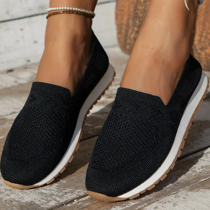 Schwarze Damen-Slipper, atmungsaktives Mesh, flach, runde Zehen, lässig, Frühling 2024.
