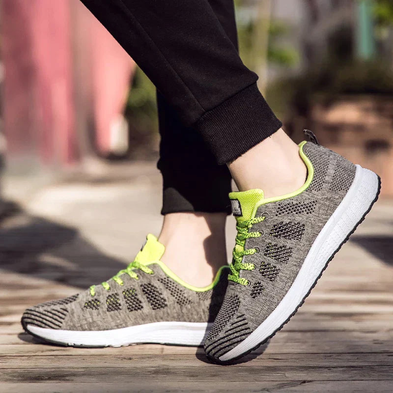 Graue Damen-Sneaker, atmungsaktiv, leicht, Outdoor, Größe 35-44, mit neon-gelben Akzenten.