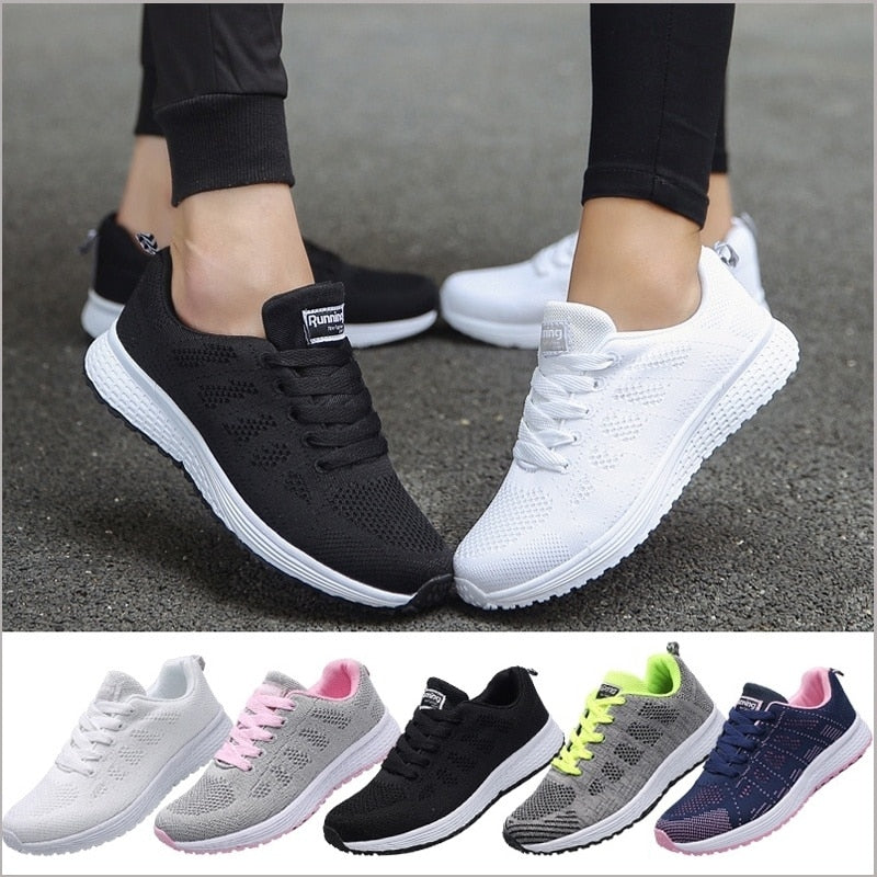 Damen Sneaker, schwarz und weiß, atmungsaktiv, leicht, für Sport und Freizeit.
