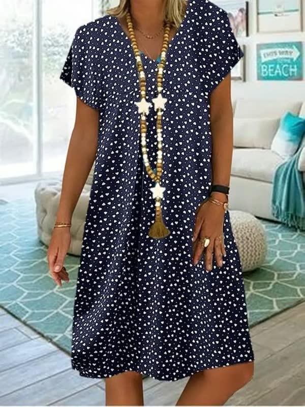 Damen Sommerkleid, blau mit weißen Punkten, V-Ausschnitt, lässig, Strandmode, Baumwolle.
