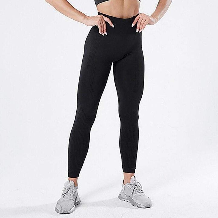 Schwarze, figurformende Leggings für Damen, nahtlos, elastisch, ideal für Sport und Freizeit.