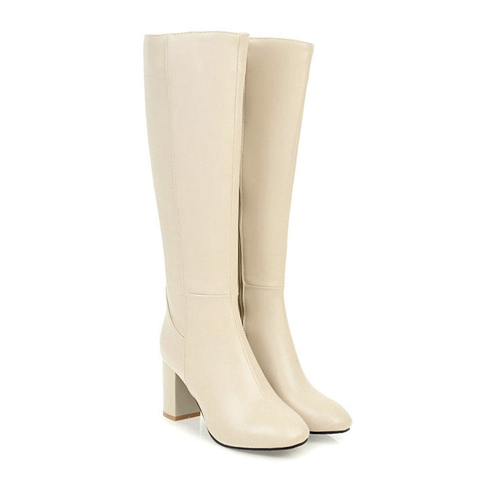 Beige Damenstiefel mit Blockabsatz, elegantes Design, hochwertiges Leder, Reißverschluss.
