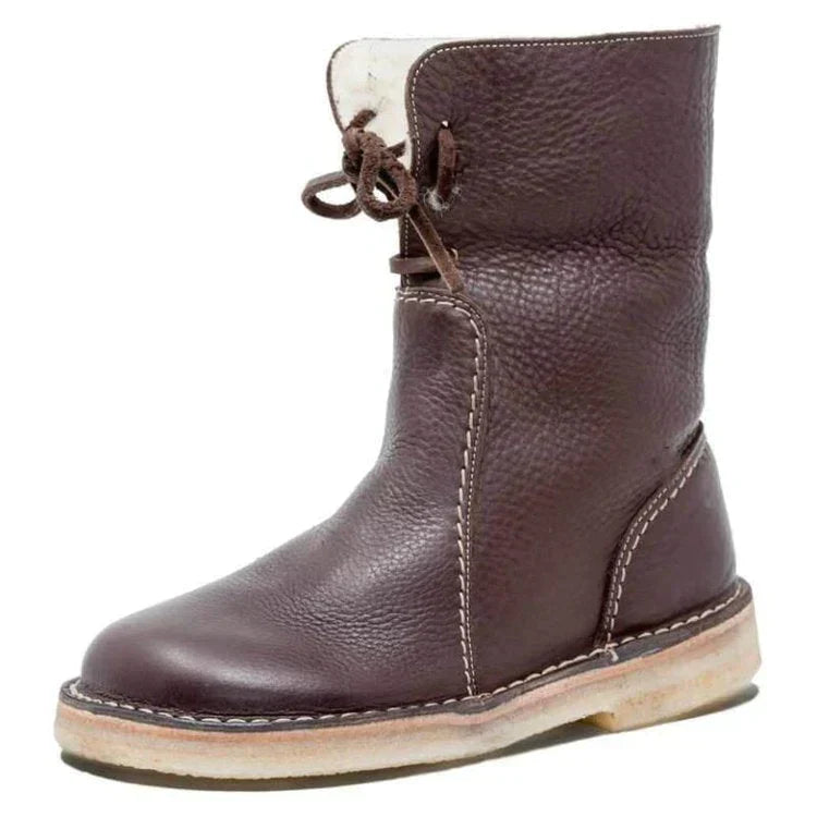 Brauner Lederstiefel mit Schnürung, rutschfeste Sohle, handgefertigt, robustes Design.