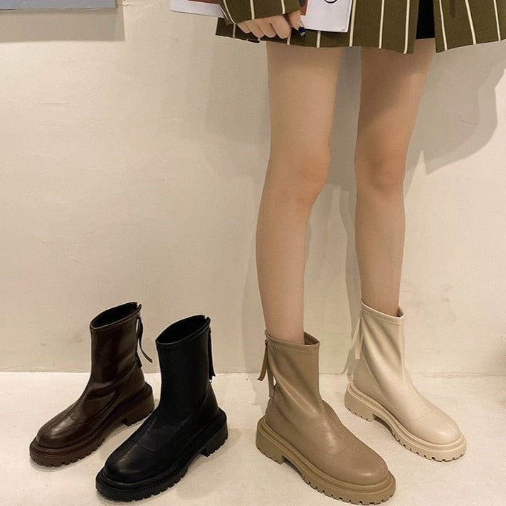Damenstiefel aus Leder in Beige, Schwarz und Braun, modisch, knöchelhoch, Herbstmode.