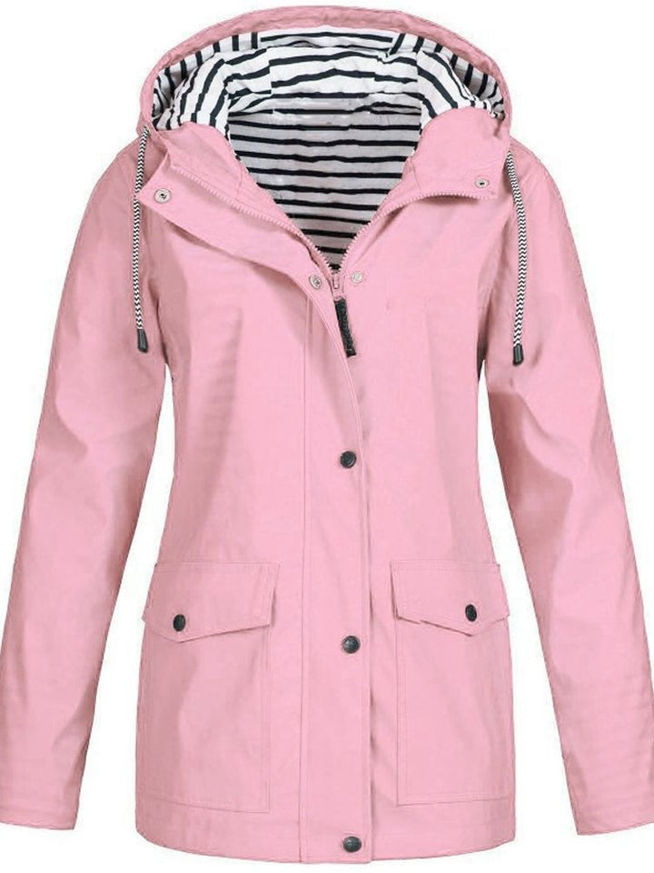 Damen-Trenchcoat rosa, Kapuze, lange Ärmel, gestreiftes Innenfutter, Herbstmode 2023.