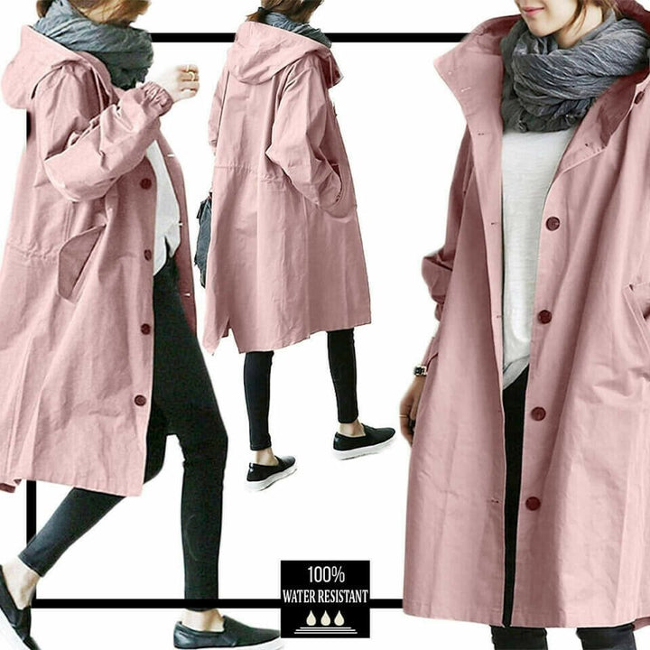 Damen Regenmantel rosa, wasserabweisend, Kapuze, modisch, Outdoor-Bekleidung, Herbstmode.