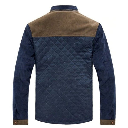 Dunkelblaue Steppjacke mit braunen Schulterpartien, Herrenmode, stilvoll und modern.
