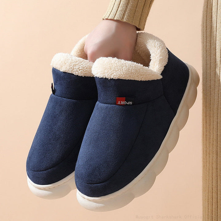 Blaue Winterhausschuhe mit weißem Plüschfutter, rutschfeste Sohle, warm und bequem.