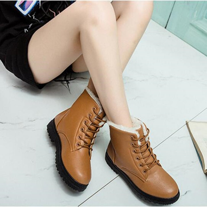 Damen Winterstiefel, braun, Kunstleder, gefüttert, rutschfeste Sohle, modisch, bequem.