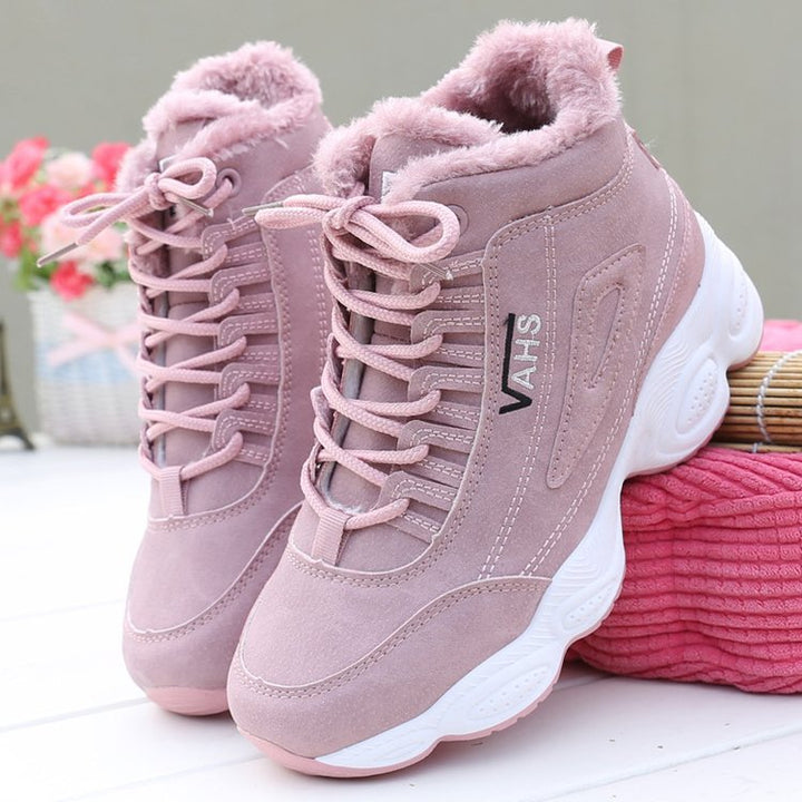 Rosa Damen-Winterschuhe mit Fellfutter, rutschfeste Sohle, modisch und warm.