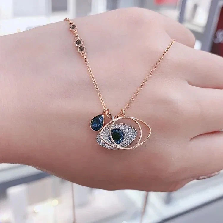 Goldene Halskette mit blauem Auge-Anhänger, Damen-Schmuck, modisch, elegant, Geschenkidee.