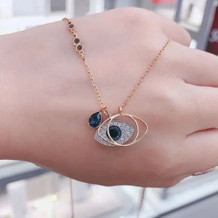 Goldene Halskette mit blauem Auge-Anhänger, Damen-Schmuck, modisch, elegant, Geschenkidee.
