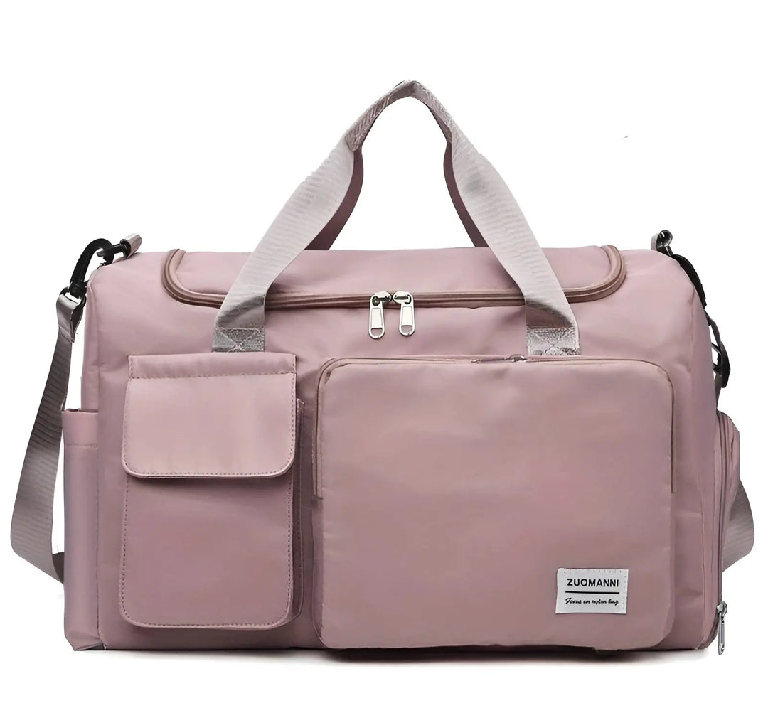 Rosa Reisetasche aus Nylon mit mehreren Fächern, verstellbarem Schultergurt, Reißverschluss.