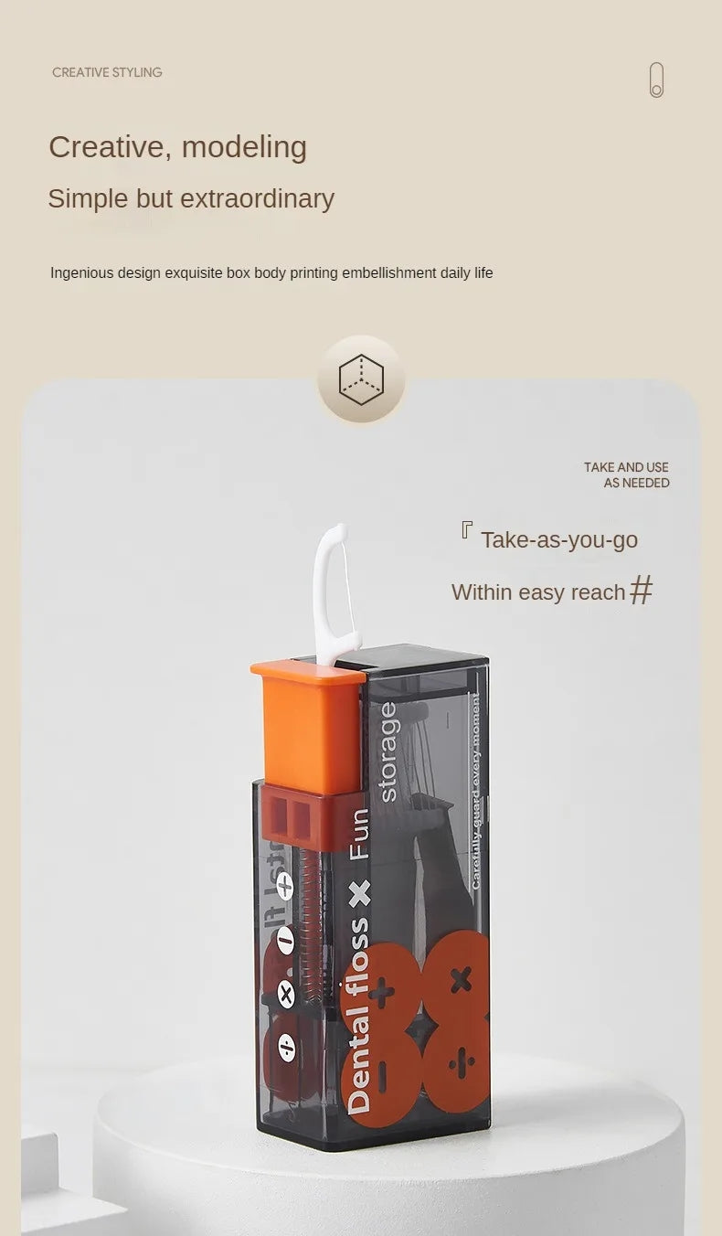 Zahnseide-Box transparent orange, tragbar, modernes Design, einfache Anwendung.