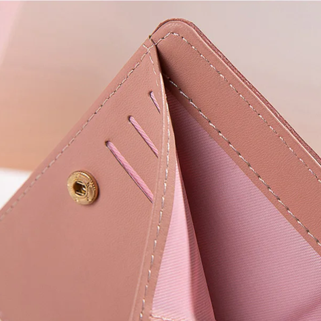 Rosa Damen-Geldbörse aus Leder mit Druckknopf, Kartenfächer, stilvolles Design.