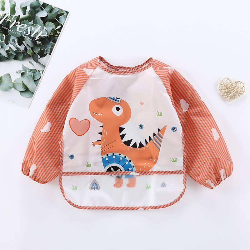 Orange Kinder-Lätzchen mit Dinosaurier-Motiv, wasserdicht, langärmlig, für Kleinkinder.
