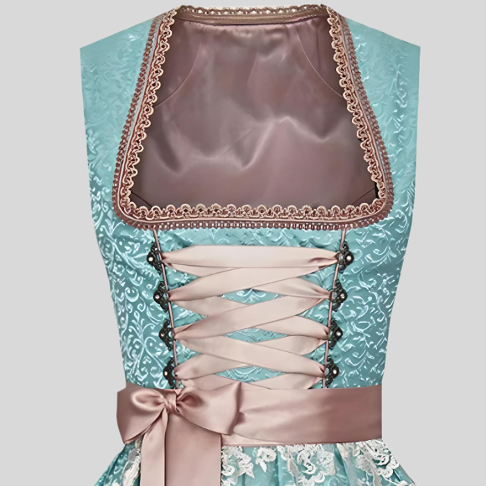 Türkises Dirndl mit rosa Schnürung und Spitze, traditionelles bayerisches Kleid, Damenmode.