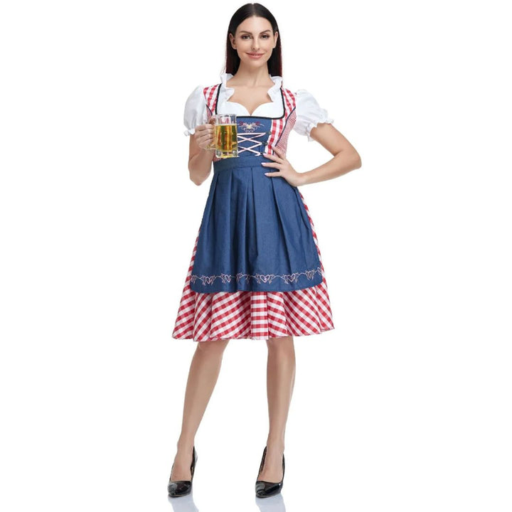 Frau im blau-roten Dirndl mit Bierkrug, Oktoberfest-Kleidung, traditionell, festlich