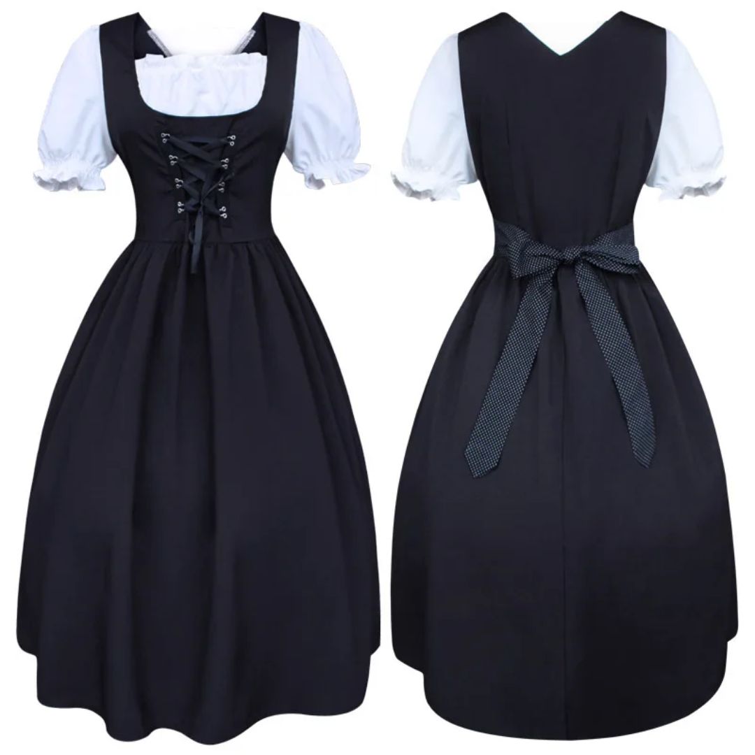 Schwarzes Dirndlkleid mit weißer Bluse, traditionell, Schnürung vorne, Schleife hinten.