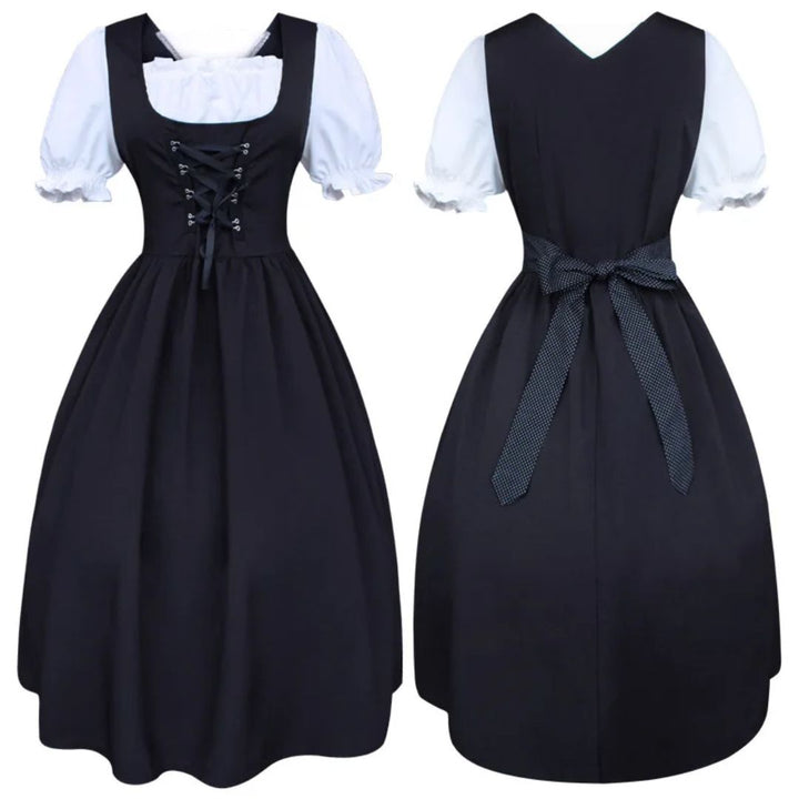 Schwarzes Dirndlkleid mit weißer Bluse, traditionell, Schnürung vorne, Schleife hinten.