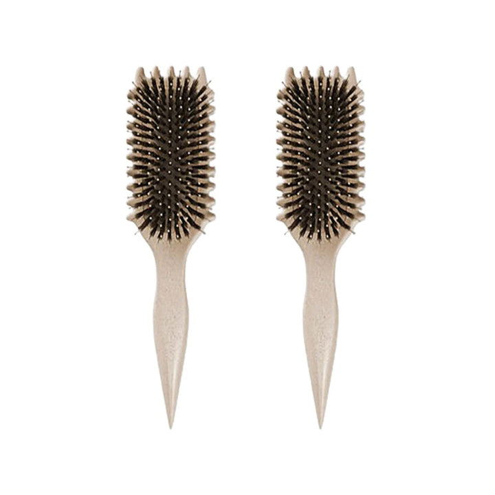Zwei beige Haarbürsten mit Naturborsten, ergonomischer Griff, ideal für Styling und Pflege.