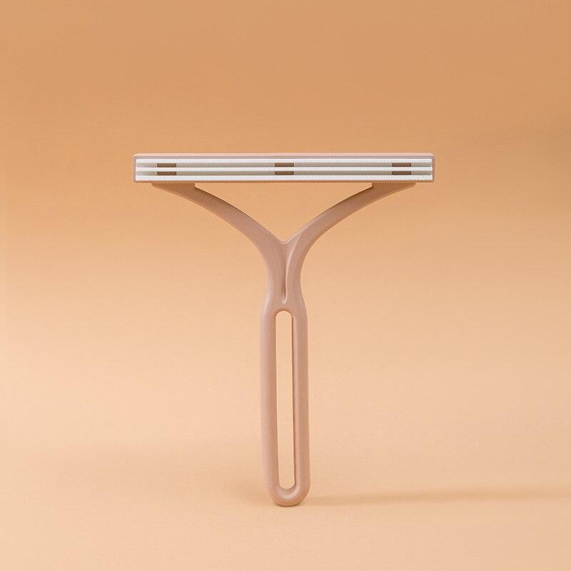 Doppelseitiger manueller Haarentferner, beige, Kunststoff, ergonomisch, für glatte Haut.
