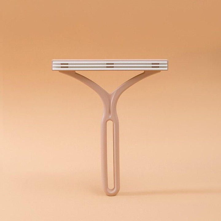 Doppelseitiger manueller Haarentferner, beige, Kunststoff, ergonomisch, für glatte Haut.