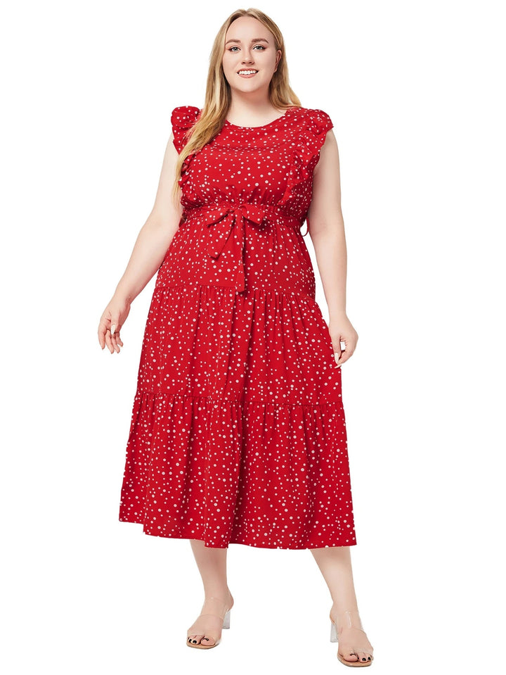 Frau im roten gepunkteten Sommerkleid mit Schleife, ärmellos, knielang, Plus-Size-Mode.