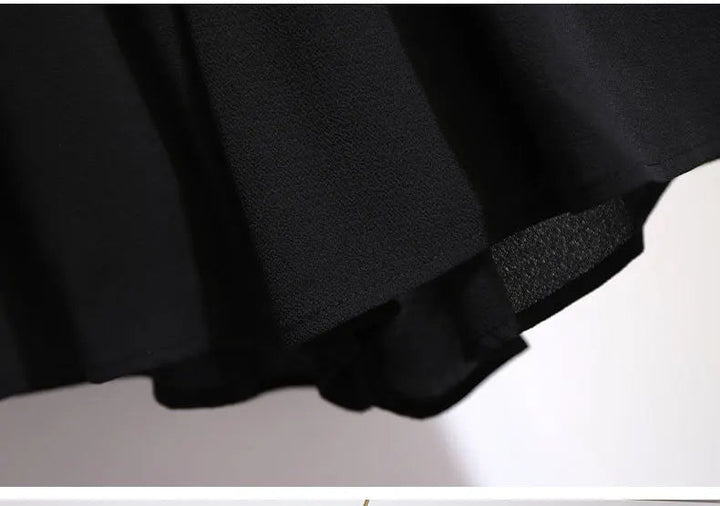Schwarzer Chiffonrock, fließend, elegant, Damenmode, knielang, Abendkleidung.