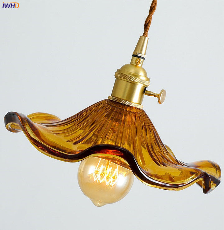Vintage Pendelleuchte aus Glas, bernsteinfarben, mit Edison-Glühbirne, Retro-Design.