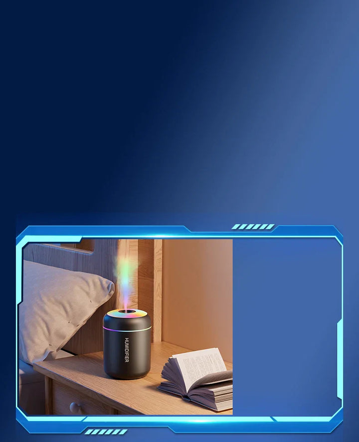 Schwarzer LED-Luftbefeuchter mit Farbwechsel auf Nachttisch neben offenem Buch.