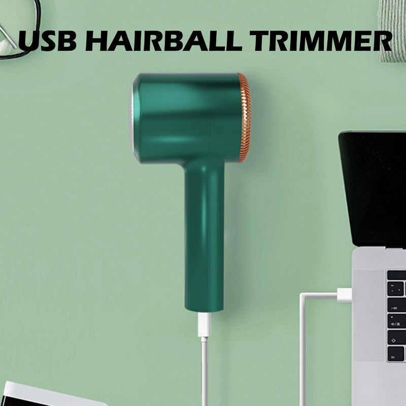 Grüner USB-Fusselrasierer, wiederaufladbar, für Kleidung, mit Laptop verbunden.