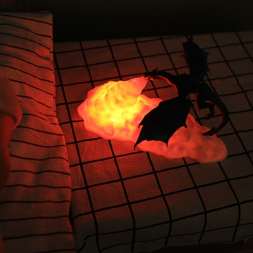 Leuchtende Drachenlampe auf kariertem Bett, Nachtlicht, LED, Kinderzimmer-Dekoration, orange.