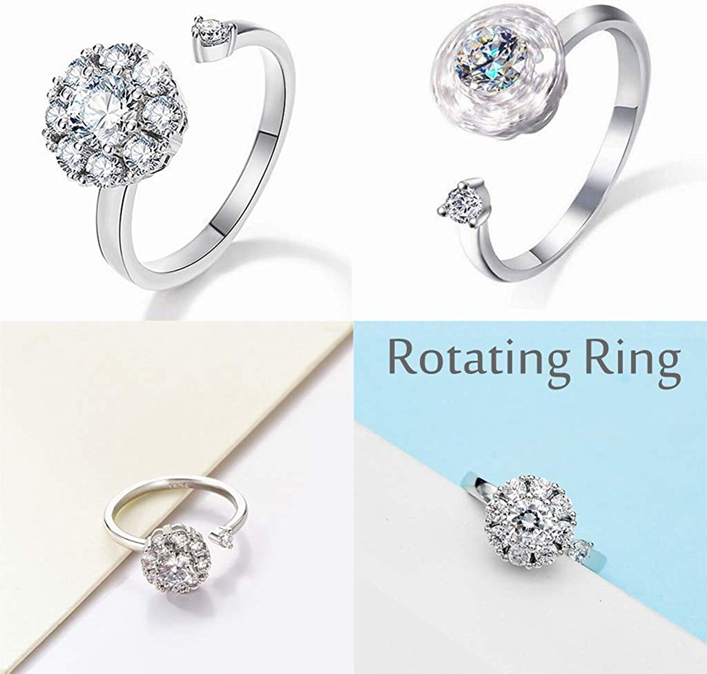 Silberner drehbarer Ring mit Kristallen, elegantes Schmuckdesign, funkelnder Damenring.