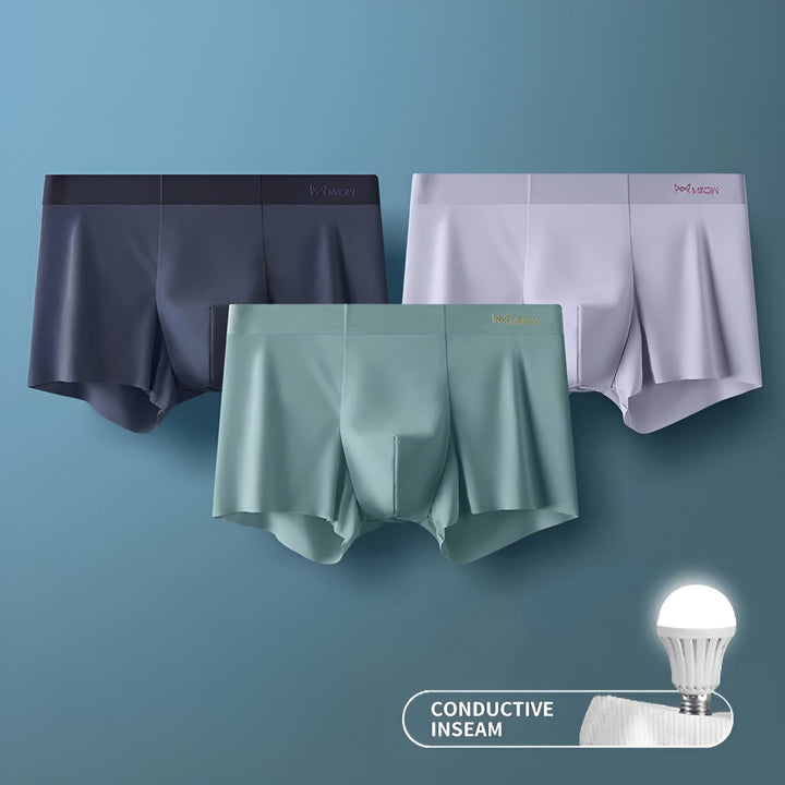 Drei Herren-Boxershorts in Grau, Weiß und Grün, nahtlos, atmungsaktiv, mit leitfähiger Naht.