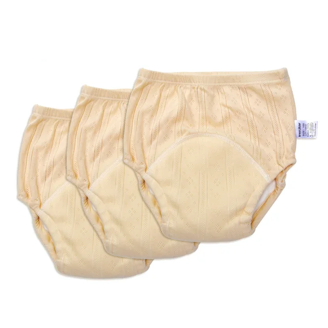 Drei beige Baby-Trainingshosen aus Baumwolle, waschbar, umweltfreundlich, wiederverwendbar.